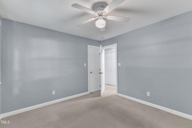 2125 Oakcrest Ct, Raleigh, NC 27612 - spare room with a ceiling fan, baseboards, and carpet