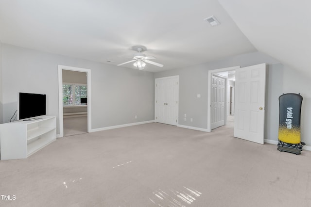 2125 Oakcrest Ct, Raleigh, NC 27612 - unfurnished living room featuring ceiling fan, light colored carpet, and baseboards