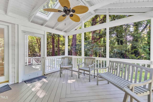 2125 Oakcrest Ct, Raleigh, NC 27612 - unfurnished sunroom featuring a ceiling fan, lofted ceiling, and a skylight