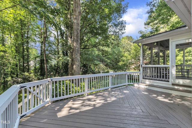 2125 Oakcrest Ct, Raleigh, NC 27612 - wooden deck with a sunroom