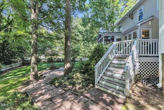 2125 Oakcrest Ct, Raleigh, NC 27612 - deck featuring stairway and a sunroom