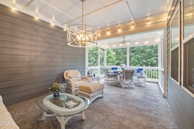 1010 Sandbar Ln, Durham, NC 27703 - sunroom featuring a ceiling fan, a chandelier, and an outdoor living space