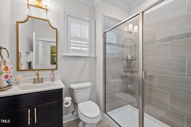 1010 Sandbar Ln, Durham, NC 27703 - bathroom featuring toilet, ornamental molding, a shower stall, and vanity