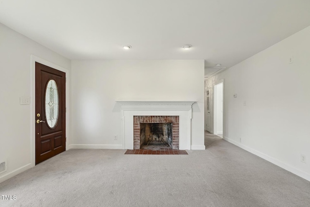 418 S W St, Cary, NC 27511 - unfurnished living room featuring carpet floors, a fireplace, and baseboards