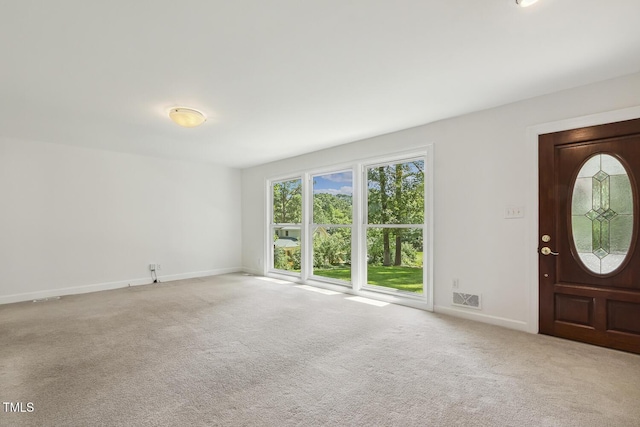 418 S W St, Cary, NC 27511 - foyer featuring baseboards and carpet flooring