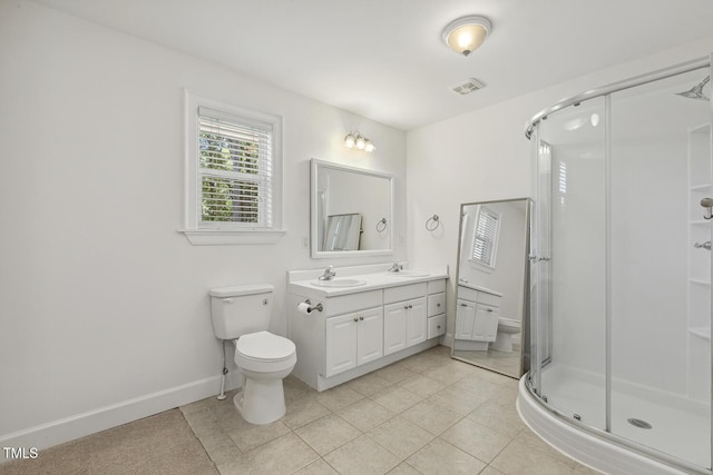 418 S W St, Cary, NC 27511 - bathroom with a stall shower, toilet, tile patterned floors, double vanity, and baseboards