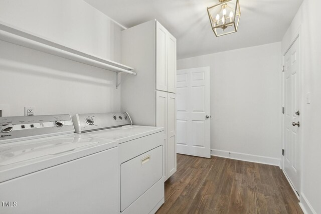 418 S W St, Cary, NC 27511 - washroom with cabinet space, washing machine and clothes dryer, dark wood-type flooring, baseboards, and a chandelier
