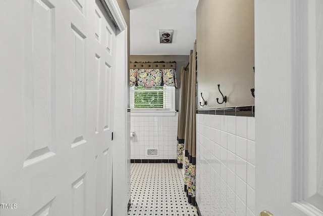 418 S W St, Cary, NC 27511 - bathroom featuring tile walls and a wainscoted wall