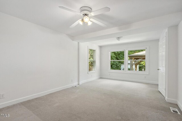 418 S W St, Cary, NC 27511 - spare room featuring carpet flooring, baseboards, and a ceiling fan