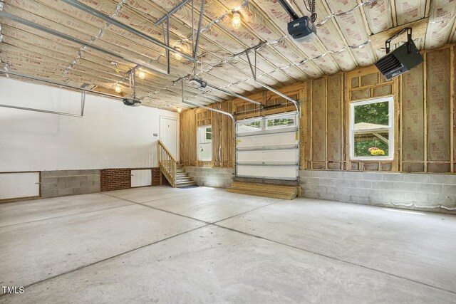 418 S W St, Cary, NC 27511 - garage with concrete block wall and a garage door opener