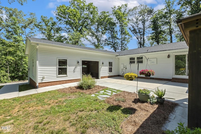 418 S W St, Cary, NC 27511 - view of front of house with a patio and a front yard