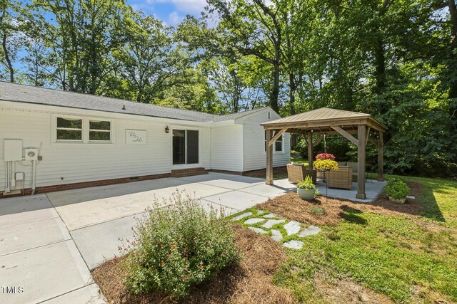 418 S W St, Cary, NC 27511 - back of house with a gazebo, a patio, outdoor lounge area, and crawl space