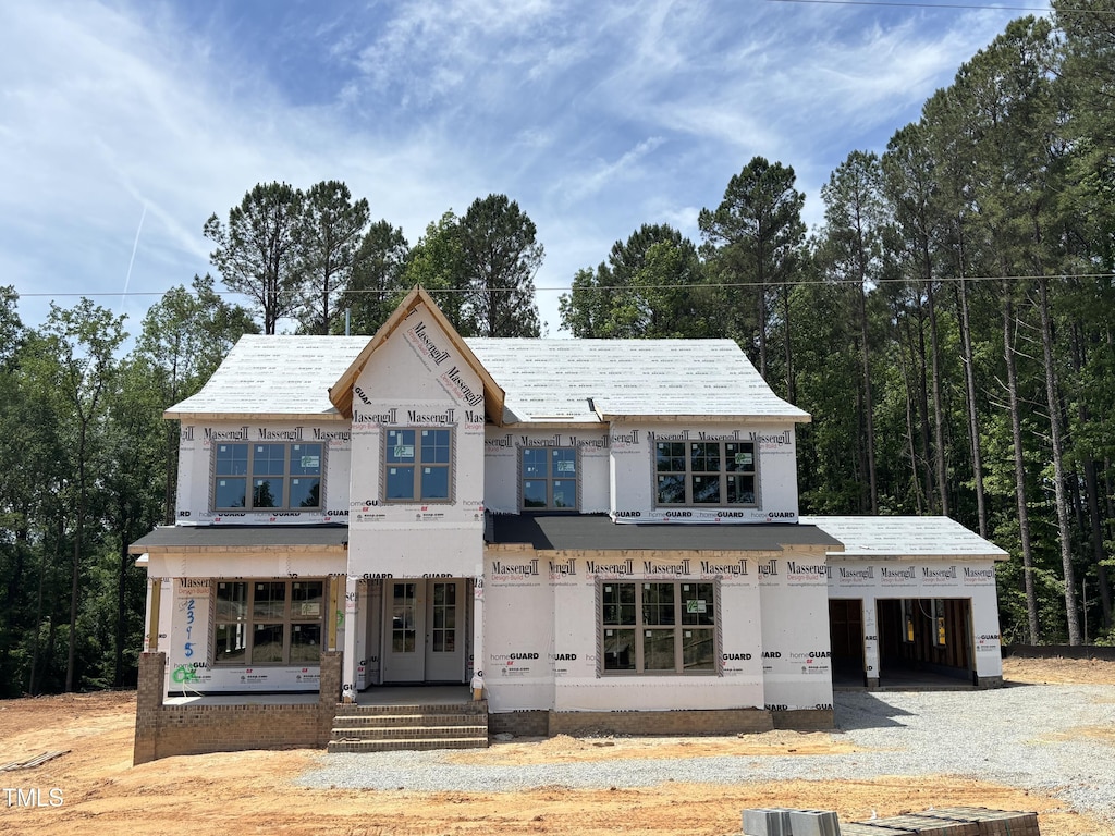 2395 Herbert Akins Rd, Fuquay Varina, NC 27526 - property in mid-construction featuring french doors and stucco siding