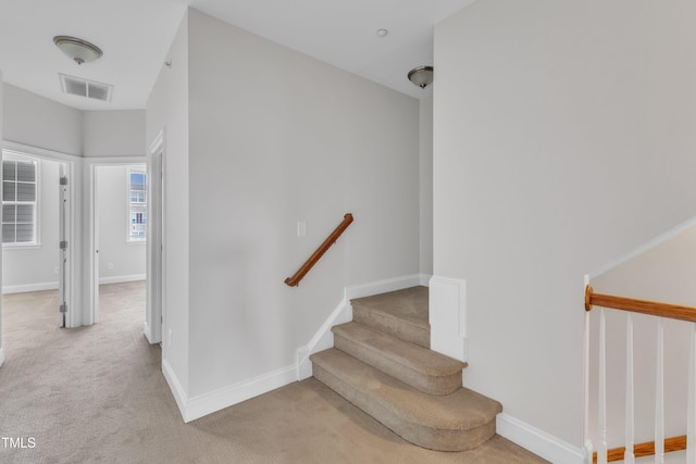 9211 Calabria Dr Unit 104, Raleigh, NC 27617 - staircase with carpet flooring and baseboards