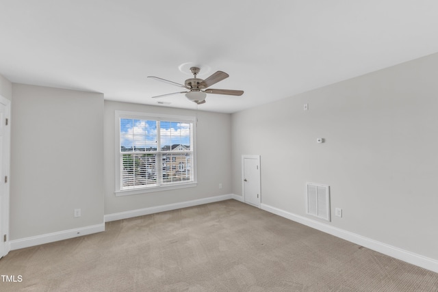9211 Calabria Dr Unit 104, Raleigh, NC 27617 - unfurnished room featuring ceiling fan, carpet floors, and baseboards