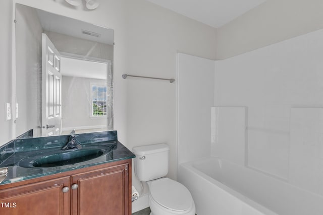 9211 Calabria Dr Unit 104, Raleigh, NC 27617 - bathroom featuring vanity, toilet, and tub / shower combination