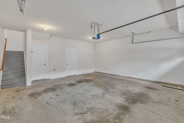 9211 Calabria Dr Unit 104, Raleigh, NC 27617 - garage with a garage door opener