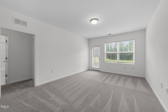 1151 Epiphany Rd, Morrisville, NC 27560 - carpeted empty room with baseboards