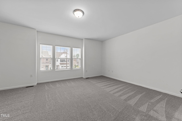 1151 Epiphany Rd, Morrisville, NC 27560 - carpeted empty room featuring baseboards