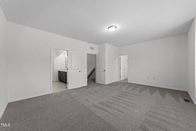 1151 Epiphany Rd, Morrisville, NC 27560 - unfurnished bedroom featuring carpet floors and ensuite bathroom