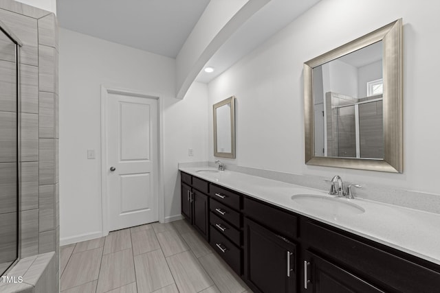 1151 Epiphany Rd, Morrisville, NC 27560 - full bathroom featuring double vanity, tiled shower, and recessed lighting
