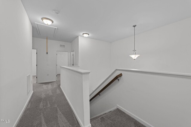 1151 Epiphany Rd, Morrisville, NC 27560 - corridor featuring attic access, an upstairs landing, and carpet floors