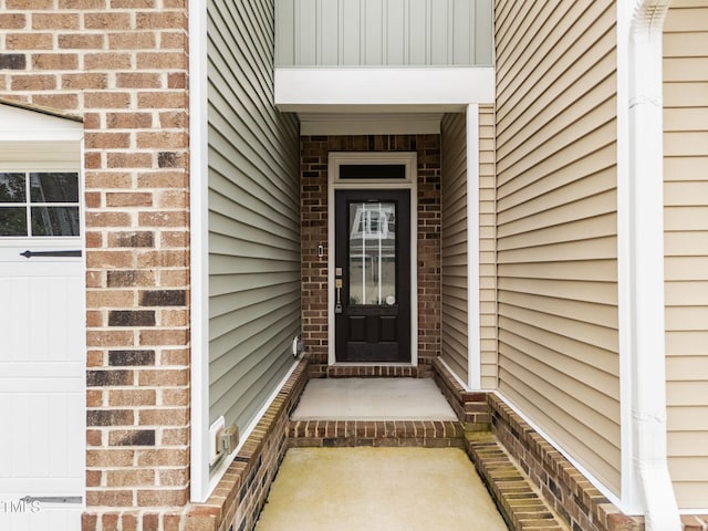 1151 Epiphany Rd, Morrisville, NC 27560 - view of exterior entry featuring brick siding