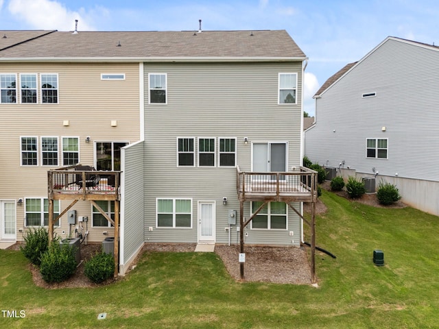 1151 Epiphany Rd, Morrisville, NC 27560 - rear view of property with a yard and a wooden deck