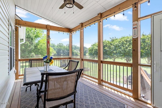 509 Spruce Meadows Ln, Willow Springs, NC 27592 - sunroom / solarium featuring ceiling fan, vaulted ceiling, outdoor dining area, and plenty of natural light