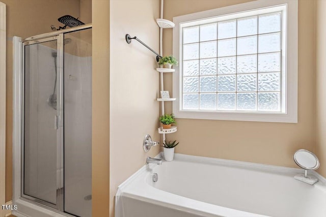 509 Spruce Meadows Ln, Willow Springs, NC 27592 - full bathroom with a shower stall, plenty of natural light, and a garden tub