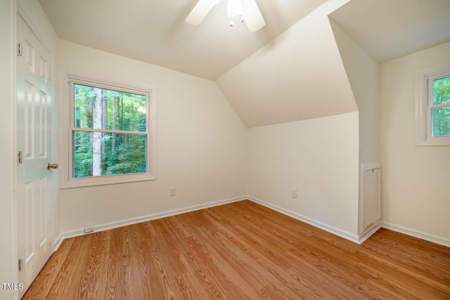 106 Redbud, Pittsboro, NC 27312 - bonus room featuring light wood finished floors, baseboards, ceiling fan, and vaulted ceiling