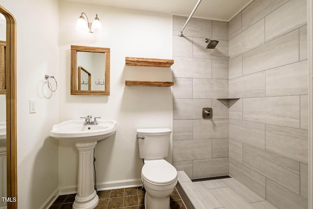 106 Redbud, Pittsboro, NC 27312 - full bath featuring toilet, a tile shower, and baseboards
