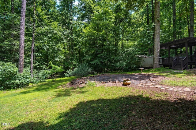 106 Redbud, Pittsboro, NC 27312 - view of grassy yard with a pergola and a view of trees
