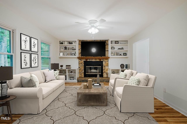 106 Redbud, Pittsboro, NC 27312 - living area featuring ceiling fan, wood finished floors, and healthy amount of natural light