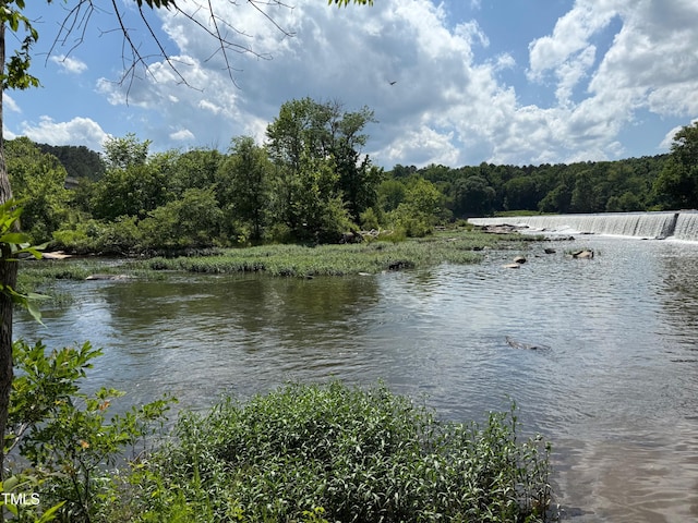 106 Redbud, Pittsboro, NC 27312 - water view featuring a forest
