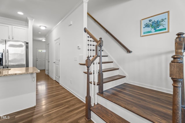 506 Oak Forest View Ln, Wake Forest, NC 27587 - staircase featuring crown molding, wood finished floors, baseboards, and recessed lighting