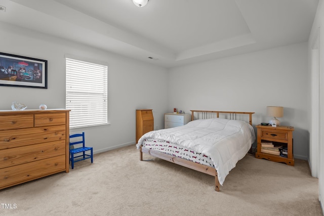 506 Oak Forest View Ln, Wake Forest, NC 27587 - carpeted bedroom with a tray ceiling and baseboards