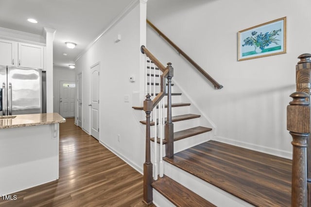 506 Oak Forest View Ln, Wake Forest, NC 27587 - stairway with crown molding, wood finished floors, baseboards, and recessed lighting