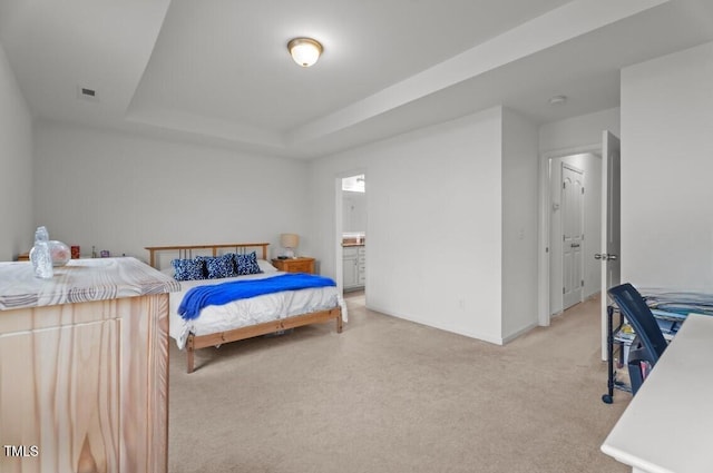 506 Oak Forest View Ln, Wake Forest, NC 27587 - bedroom with carpet flooring, a tray ceiling, baseboards, and ensuite bath