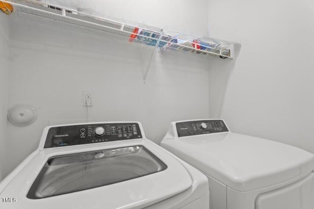 506 Oak Forest View Ln, Wake Forest, NC 27587 - washroom featuring washing machine and dryer