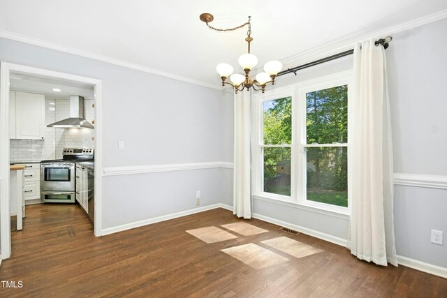6912 Baywood Dr, Raleigh, NC 27613 - unfurnished dining area featuring a chandelier, crown molding, dark wood-style flooring, and baseboards