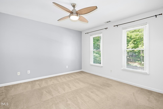 6912 Baywood Dr, Raleigh, NC 27613 - carpeted empty room featuring baseboards and a ceiling fan