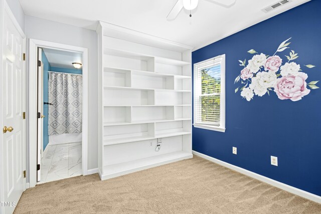 6912 Baywood Dr, Raleigh, NC 27613 - unfurnished bedroom with carpet, ensuite bathroom, baseboards, and ceiling fan
