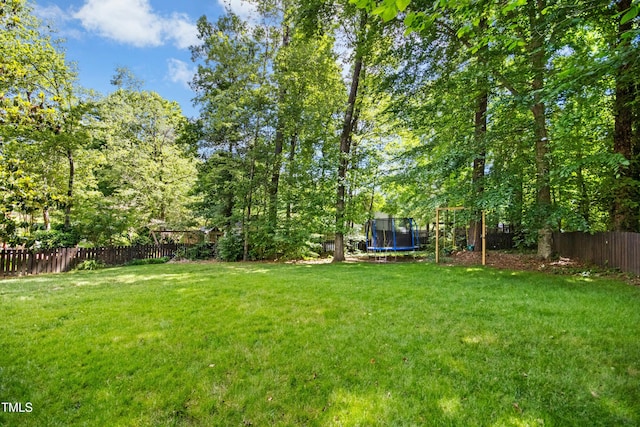 6912 Baywood Dr, Raleigh, NC 27613 - view of yard featuring a trampoline