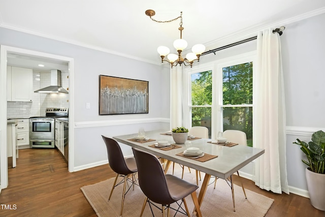 6912 Baywood Dr, Raleigh, NC 27613 - dining room featuring a chandelier, crown molding, dark wood-type flooring, and baseboards