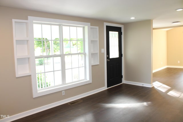 10180 Buffalo Rd, Clayton, NC 27527 - entrance foyer featuring plenty of natural light, dark wood finished floors, baseboards, and recessed lighting