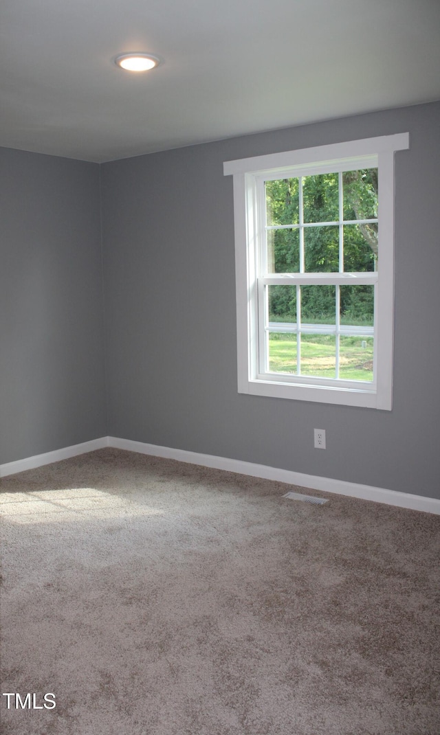 10180 Buffalo Rd, Clayton, NC 27527 - empty room with baseboards and carpet