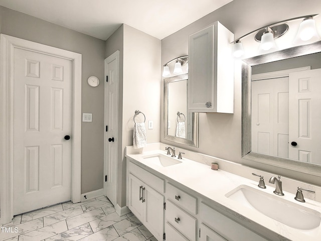107 Long Shadow Ln, Cary, NC 27518 - full bath featuring marble finish floors, double vanity, and baseboards