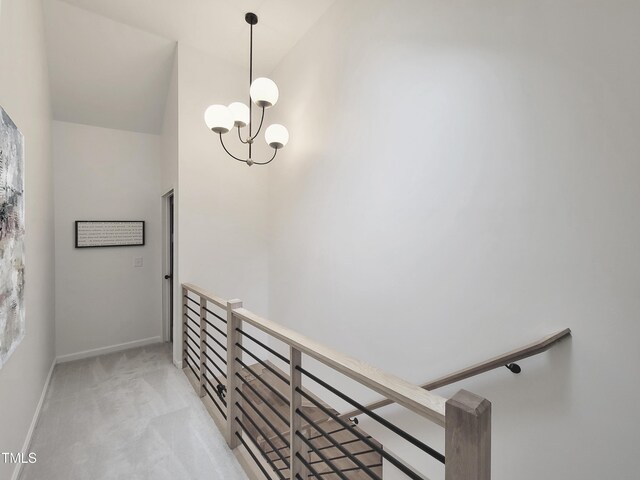 107 Long Shadow Ln, Cary, NC 27518 - stairs featuring carpet, a chandelier, and baseboards