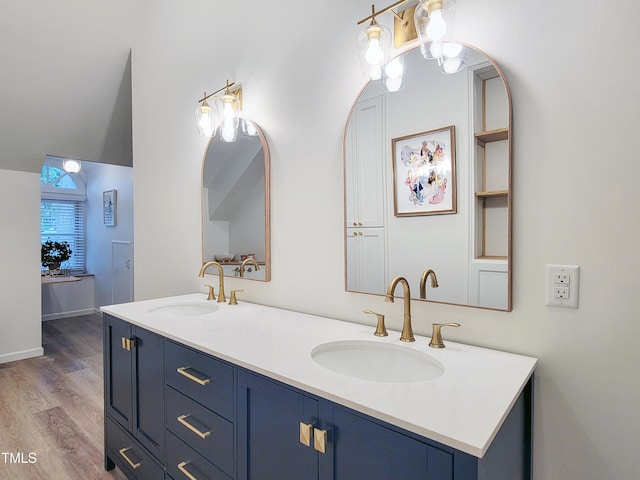 107 Long Shadow Ln, Cary, NC 27518 - bathroom with double vanity and wood finished floors